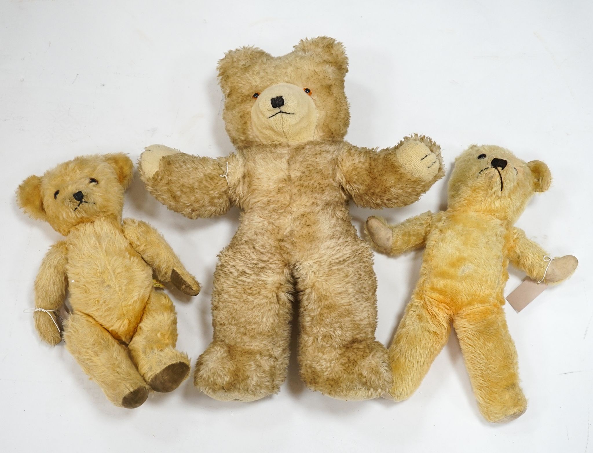 Wendy Boston, 24in. with label, good condition, together with a Deans with label, 18in., good condition and an unjointed 1950's English bear, 19in.